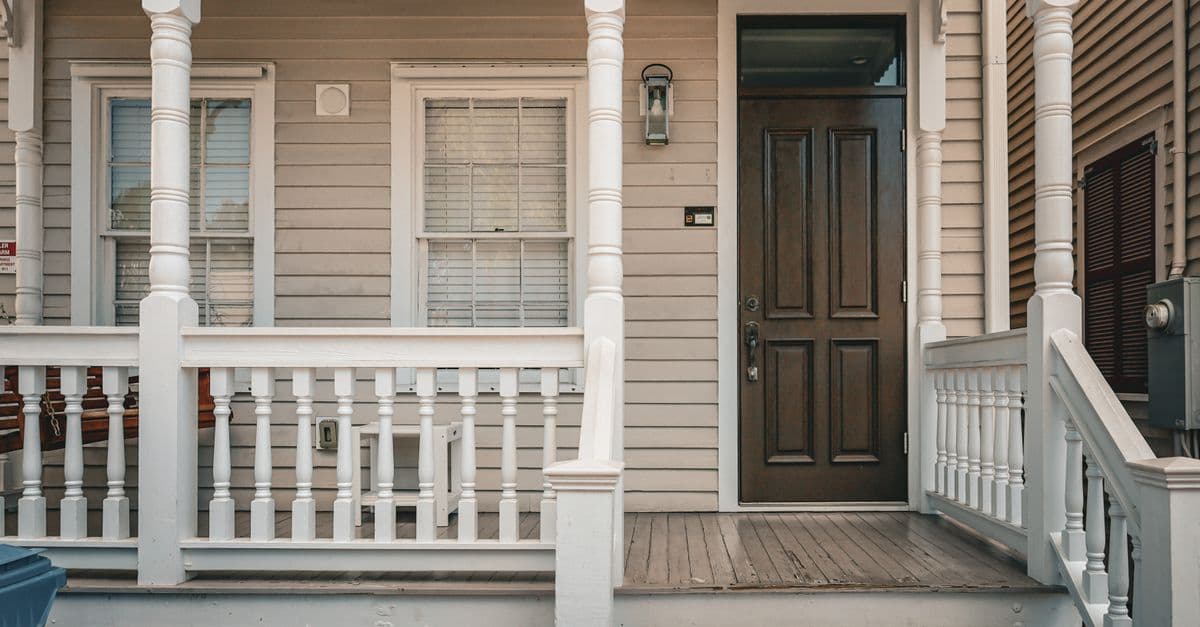 The welcoming front entrance of a craftsman-style residential home.